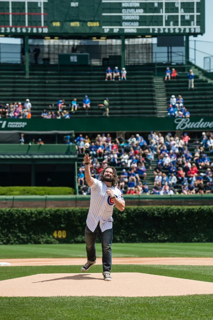 Clay Cook of Zac Brown Band throws out the first pitch at Wrigley Field.