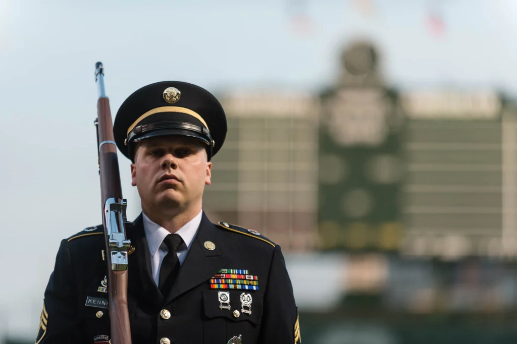 CHICAGO, IL - APRIL 5: A member of the Color Guard stands at attention during singing of the National Anthem before the Opening Night game against the St. Louis Cardinals at Wrigley Field on Sunday, April 5, 2015 in Chicago, Illinois. (Photo by Matt Kosterman/MLB Photos via Getty Images)