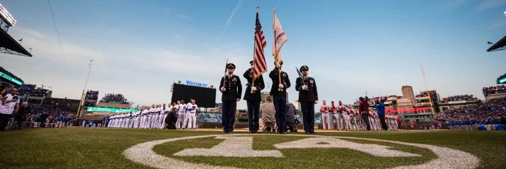 CHICAGO, IL - APRIL 5: The Color Guard stands at attention during the ceremony before the Opening Night game against the St. Louis Cardinals at Wrigley Field on Sunday, April 5, 2015 in Chicago, Illinois. (Photo by Matt Kosterman/MLB Photos via Getty Images)