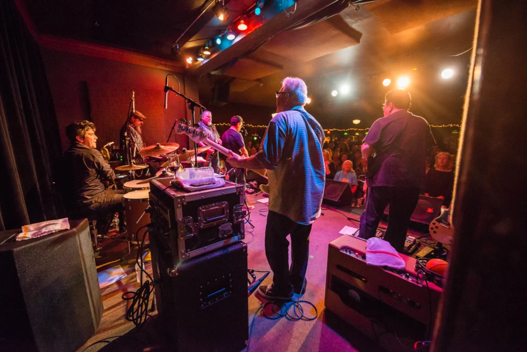 A behind the scenes shot of Los Lobos performing at Fitzgerald's in Berwyn, Illinois.