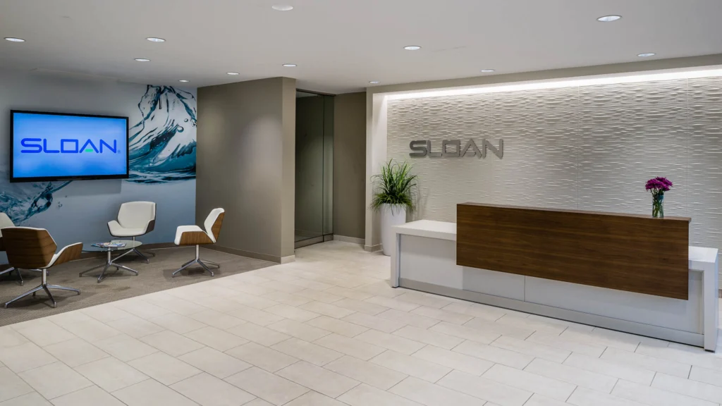 The lobby of the Sloan Valve Company's headquarters building in Franklin Park, Illinois after the remodel by Whitney Architects.
