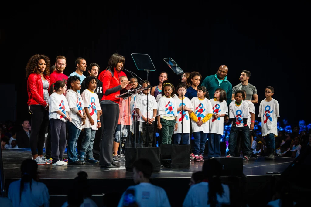 First Lady Michelle Obama with students and athletes at the 2013 Let's Move event held at Chicago's McCormick Place.
