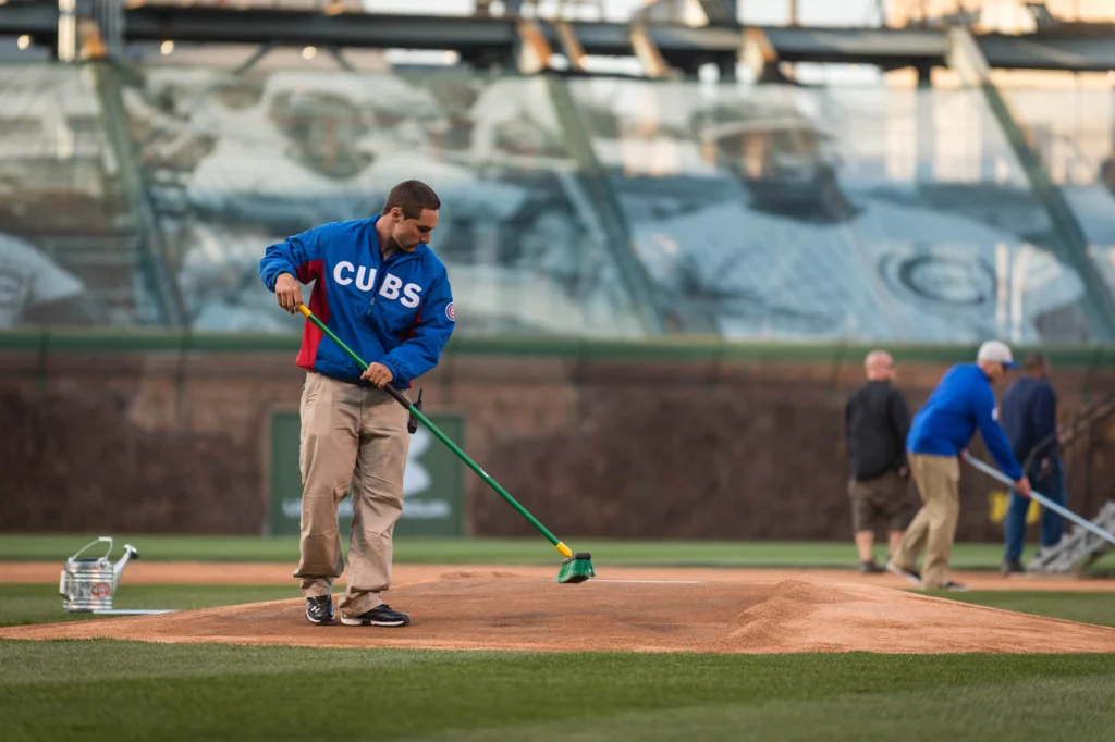 CHICAGO, IL - APRIL 5: The grounds crew prepares the field before the Opening Night game against the St. Louis Cardinals at Wrigley Field on Sunday, April 5, 2015 in Chicago, Illinois. (Photo by Matt Kosterman/MLB Photos via Getty Images)