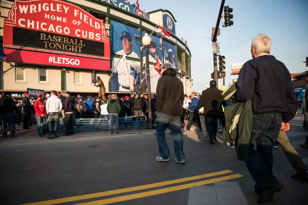 CHICAGO, IL - APRIL 5:  Fans cross Clark Street before the Opening Night game against the St. Louis Cardinals at Wrigley Field on Sunday, April 5, 2015 in Chicago, Illinois. (Photo by Matt Kosterman/MLB Photos via Getty Images)