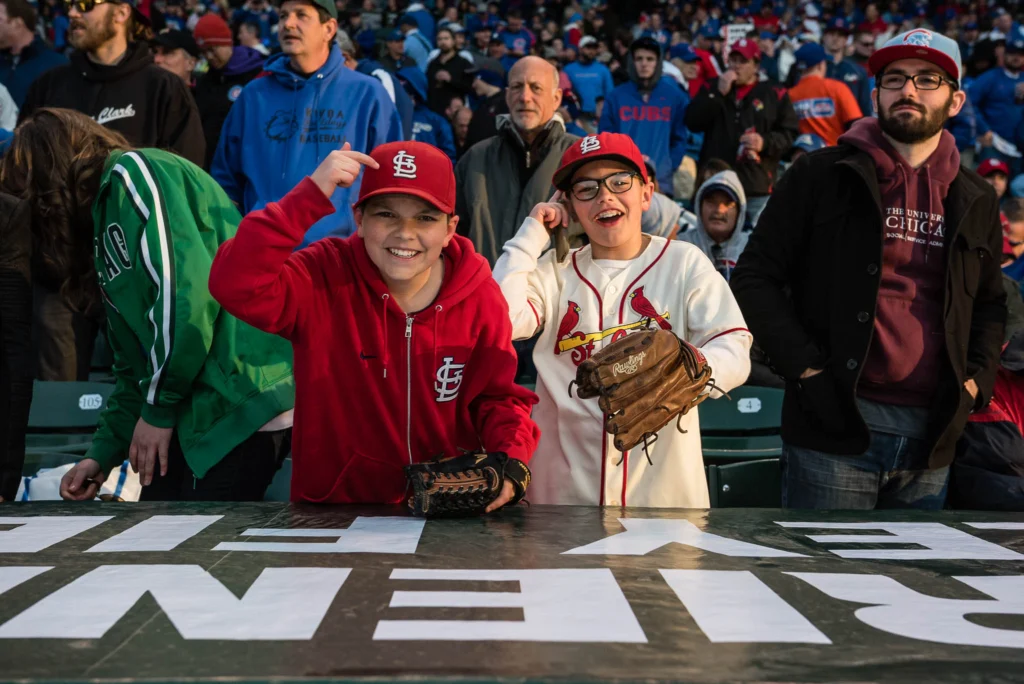 CHICAGO, IL - APRIL 5: Cardinals fans show their colors before the Opening Night game against the St. Louis Cardinals at Wrigley Field on Sunday, April 5, 2015 in Chicago, Illinois. (Photo by Matt Kosterman/MLB Photos via Getty Images)