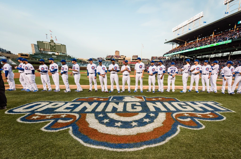 CHICAGO, IL - APRIL 5:  The Chicago Cubs line up for the pre-game ceremony at the Opening Night game against the St. Louis Cardinals at Wrigley Field on Sunday, April 5, 2015 in Chicago, Illinois. (Photo by Matt Kosterman/MLB Photos via Getty Images)