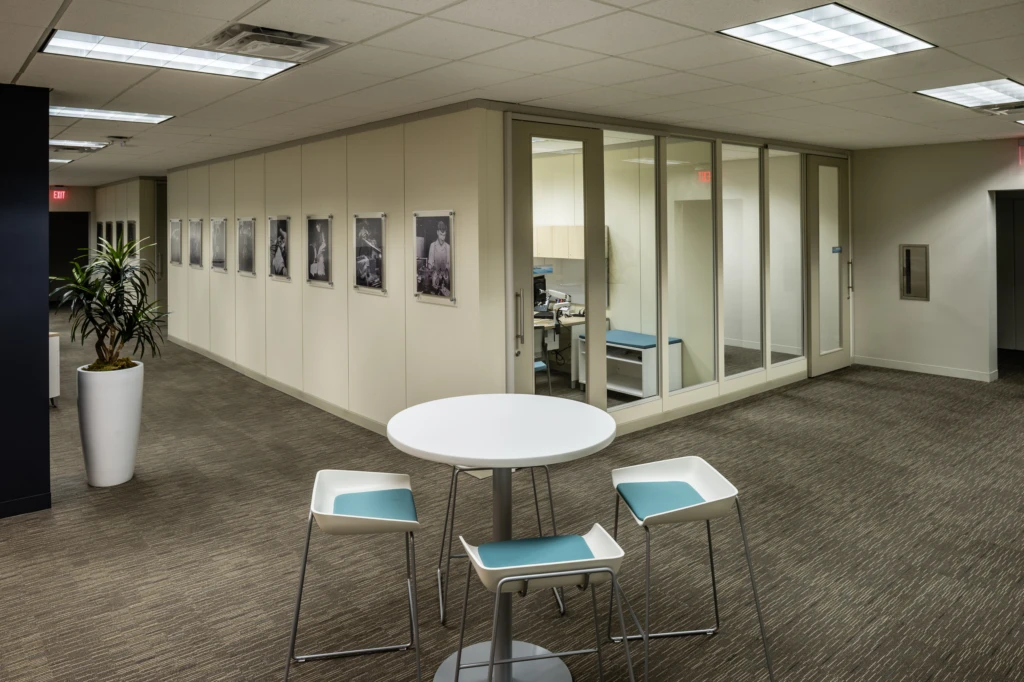 Alternate view of the engineering area at Sloan Valve Company headquarters in Franklin Park, Illinois. Prints on wall were produced by Matt Kosterman.