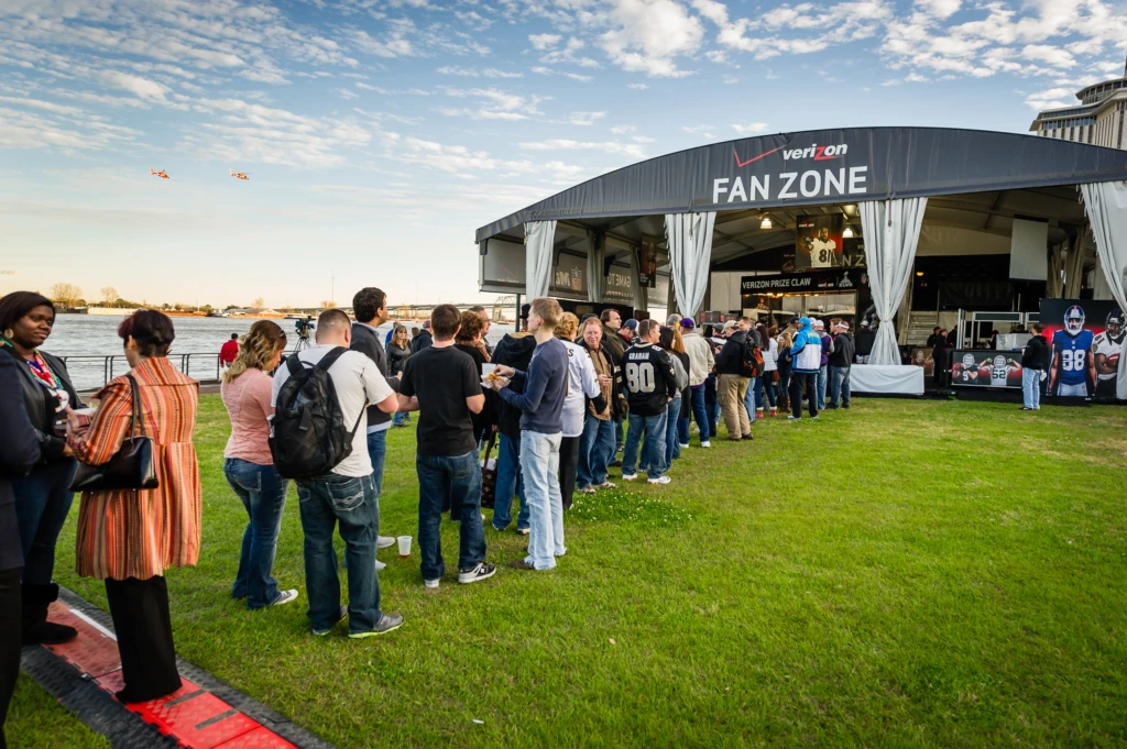 Eager fans queue up for Marketing Werks' Verizon Fan Zone activation at Super Bowl XLVII.