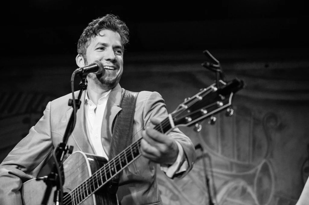 Cruz Contreras of the Black Lillies sings at the OPRF Food Pantry benefit concert at Fitzgerald's.