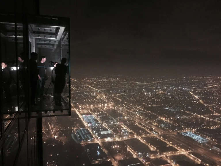 Assistant at all-night session at top of Willis Tower, Apple