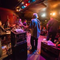 A behind the scenes shot of Los Lobos performing at Fitzgerald's in Berwyn, Illinois.
