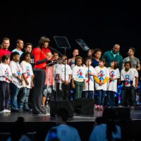 First Lady Michelle Obama with students and athletes at the 2013 Let's Move event held at Chicago's McCormick Place.